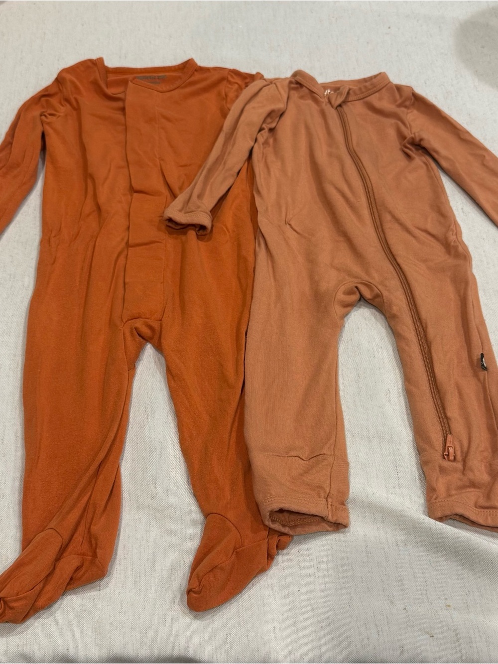 Kyte Baby + Magnetic Me Bundle Set Rust Orange Footed Sleeper Modal Bamboo 3-6m